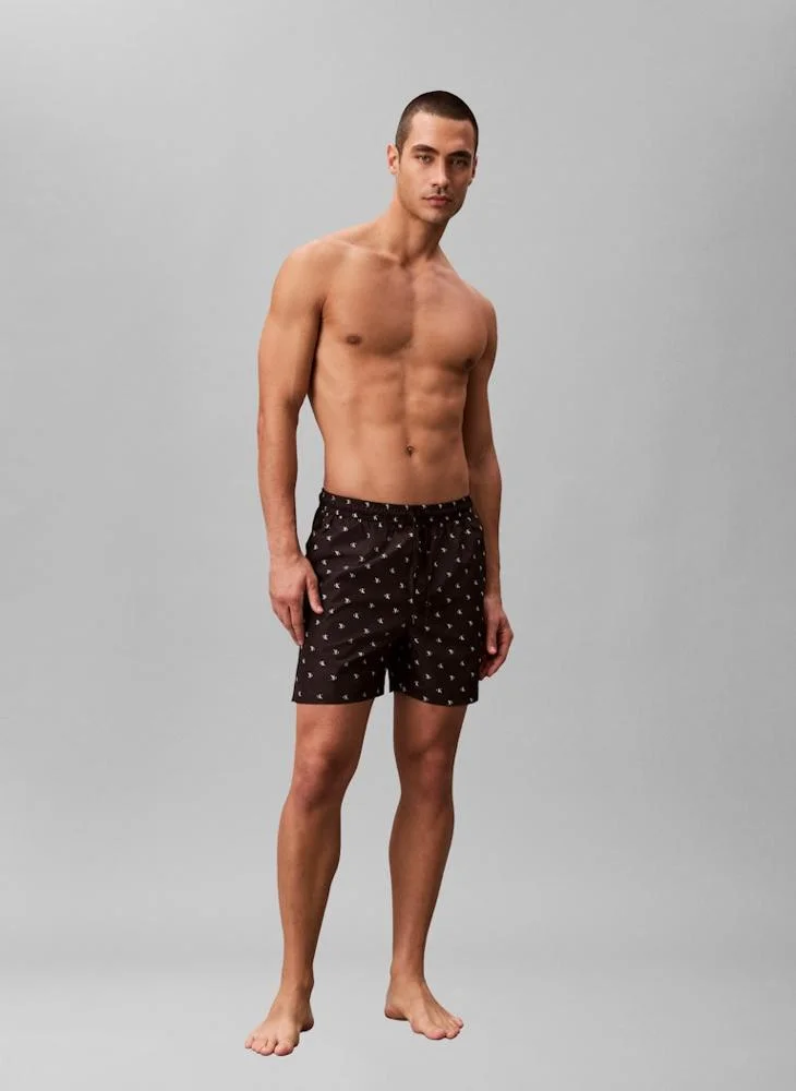 CALVIN KLEIN  Solid Swim Shorts for Men | Best Price UAE
